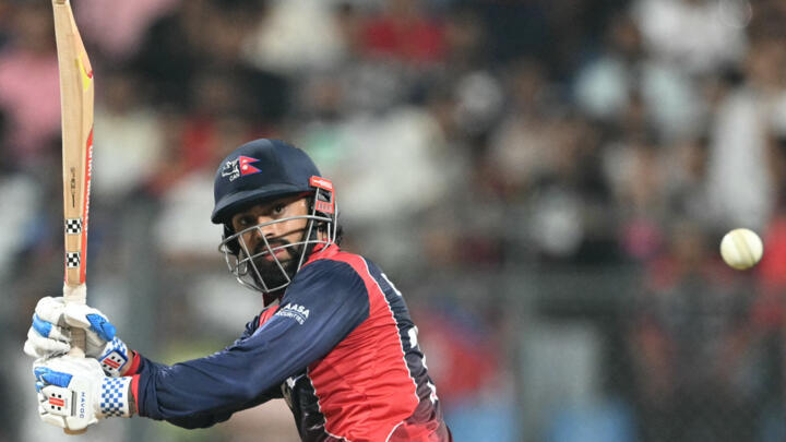 Nepal's Kushal Bhurtel plays a shot during the 2026 ICC Men's T20 Cricket World Cup group stage match between Nepal and Scotland at the Wankhede Stadium in Mumbai on February 17, 2026