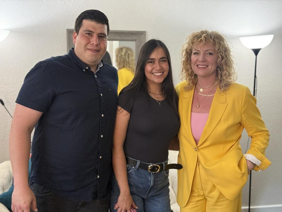 Victor and Maria Betania Uzategui-Castillo, with Kate Lincoln-Goldfinch, the family's lawyer
