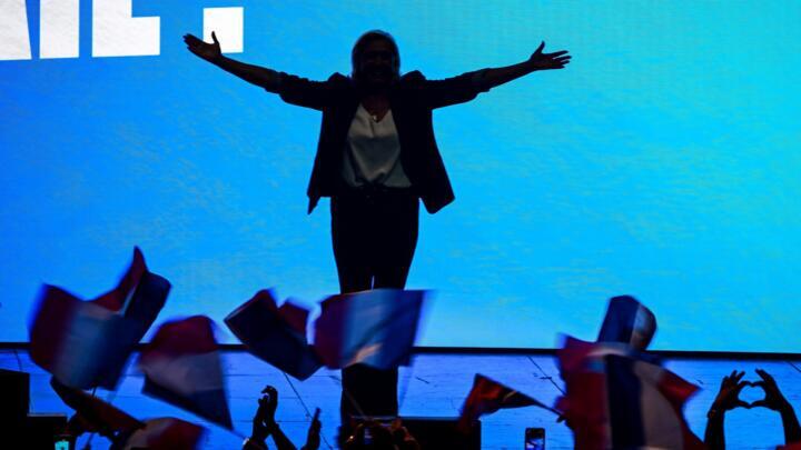 The leader of France's National Rally party Marine Le Pen gestures as she arrives to deliver a speech in Macon on May 1, 2026