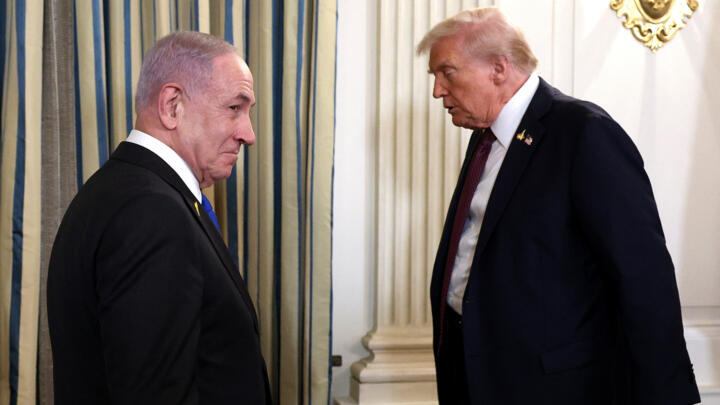 US President Donald Trump (R) and Israeli Prime Minister Benjamin Netanyahu leave at the end of a joint news conference in the State Dining Room at the White House on September 29, 2025 in Was