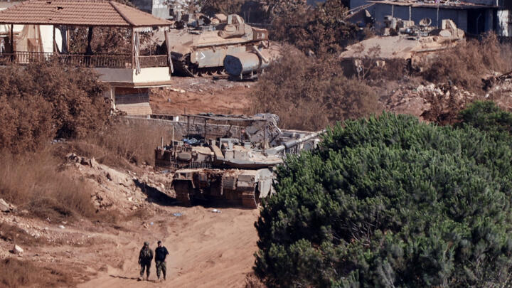 A photograph taken from the southern Lebanese village of Zawtar al-Gharbiyah showing Israeli troops stationed in the nearby village of Zawtar al-Charkiyah on August 11, 2026