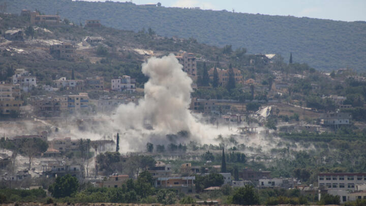 This photo, taken from the village of Al-Haniyya in southern Lebanon, shows smoke rising from a controlled explosion carried out by Israeli forces at neighboring village, Al-Mansouri, on September 4.
