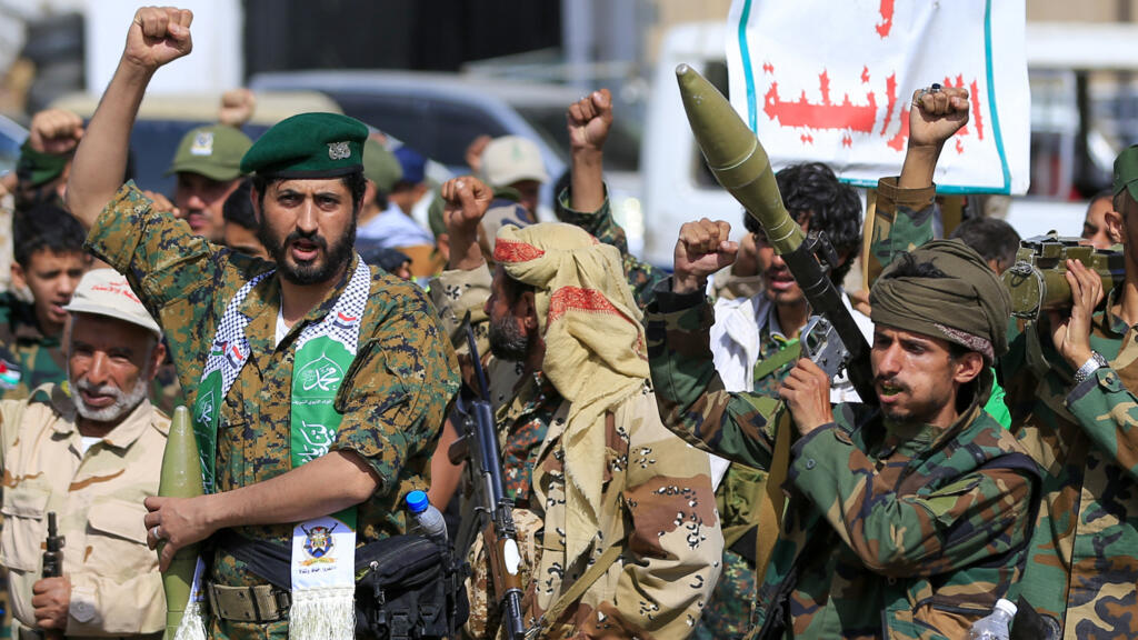 Houthi fighters shout slogans during a rally in Sanaa on September 10, 2026