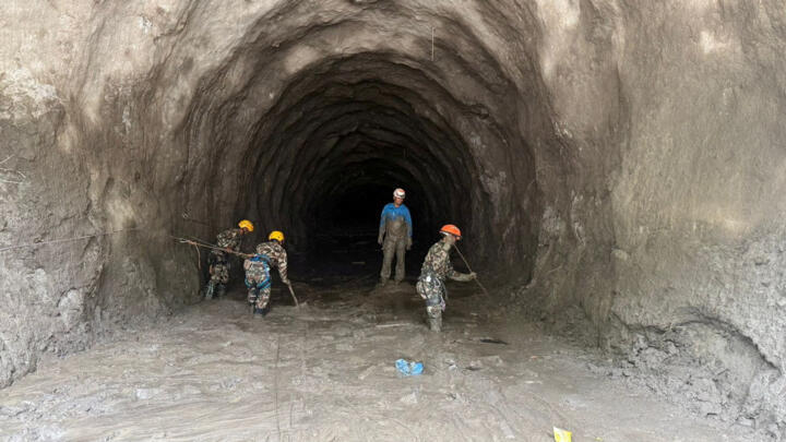 Nepal races to rescue workers trapped in tunnel