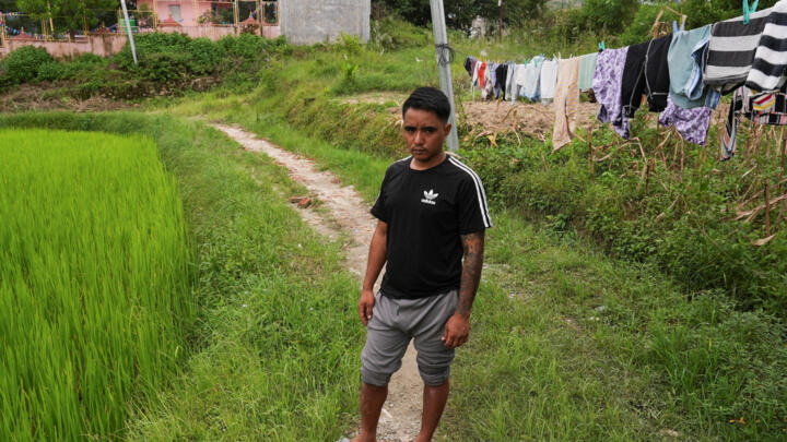 Dhan Bahadur Tamang, a 32-year-old survivor of the tunnel flooding at the Upper Trishuli 1 Hydroelectric Project, outside his home, in Tarkeshwar, Bagmati Province, Nepal September 3, 2026