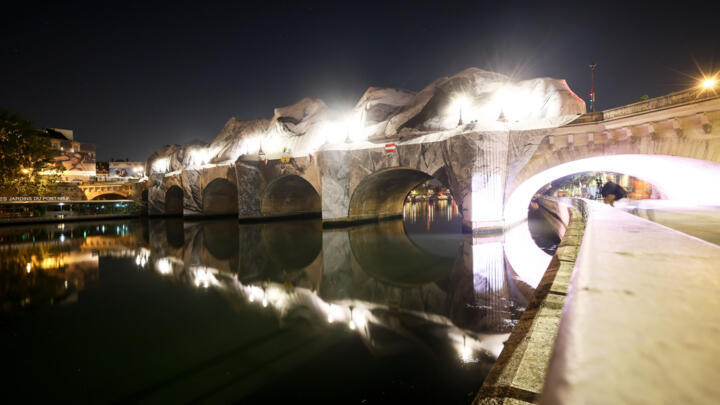 Inflation of the artwork "The Pont Neuf Cave" by French street artist JR on the Pont Neuf bridge, May 21, 2026, in Paris.
