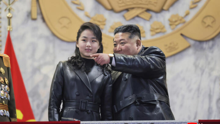 North Korean leader Kim Jong Un (R) and his daughter Kim Ju Ae attending a military parade on February 25, 2026