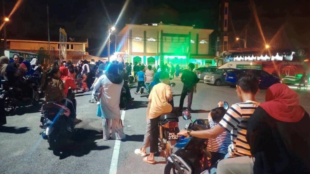 Cover image: This picture, taken in Kuala Muda on July 26, 206, shows one of the buses reportedly used to send Rohingya refugees back to Kuala Lumpur.