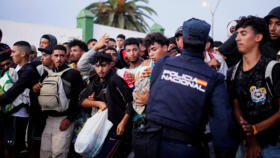 Hundreds of migrants clash with police after crossing from Morocco to Ceuta, Spain, September 13, 2026.