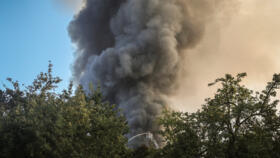 Firefighters work at a site of a Russian drone strike in Kyiv, Ukraine September 16, 2026
