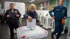 A voter casts a ballot in the parliamentary election in Moscow, Russia, on September 18, 2026