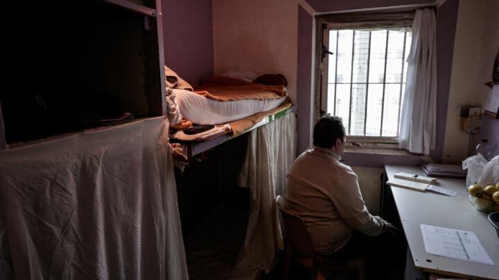 A detainee is pictured in his prison cell at the Hauts-de-Seine remand centre.