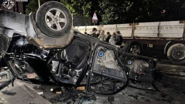 This handout photograph published on July 9, 2026 shows an overturned Ukrainian army conscription vehicle in Lviv following unrest