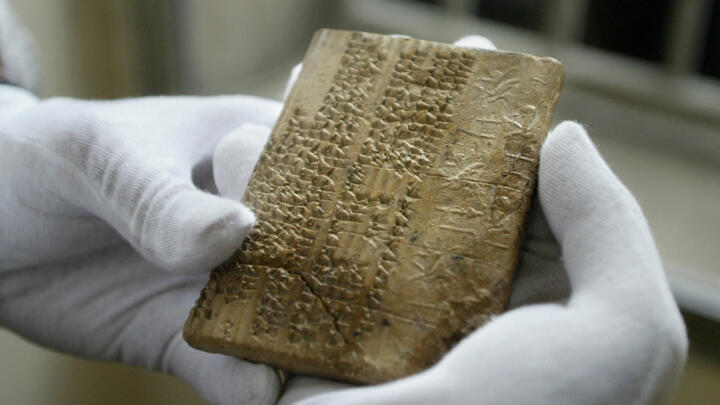 An Archaemenian clay tablet written in the Elamite scripts is shown at Iran's National Museum in Tehran.