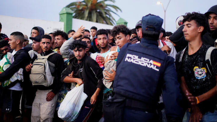 Hundreds of migrants clash with police after crossing from Morocco to Ceuta, Spain, September 13, 2026.