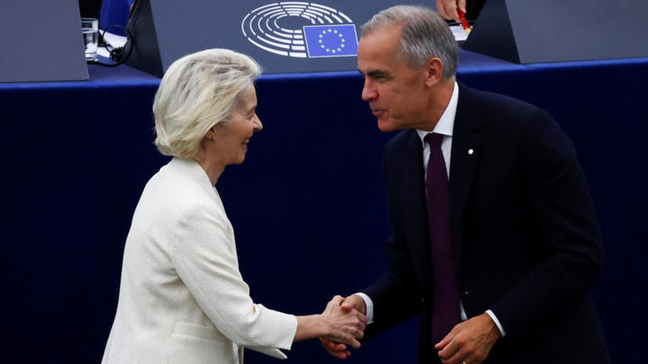 Canadian Prime Minister Mark Carney shakes hands with European Commission President Ursula von der Leyen as he attends her State of the European Union address (SOTEU) to the European Parliament, in Strasbourg, France, September 16, 2026