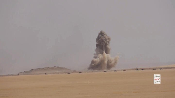 Smoke billows into the sky in a screengrab from a video said to show Houthi fighters attacking Saudi-backed forces in Yemen,  September 15, 2026.