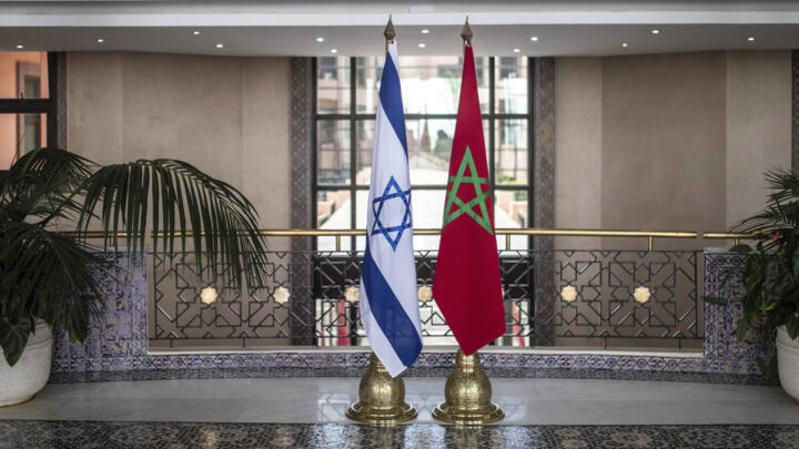 Moroccan and Israeli flags are displayed in the Moroccan Foreign Ministry in Rabat, Morocco, Aug. 11, 2021.