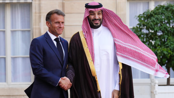 French President Emmanuel Macron greets Saudi Crown Prince Mohammed bin Salman in Paris, August 24, 2026.