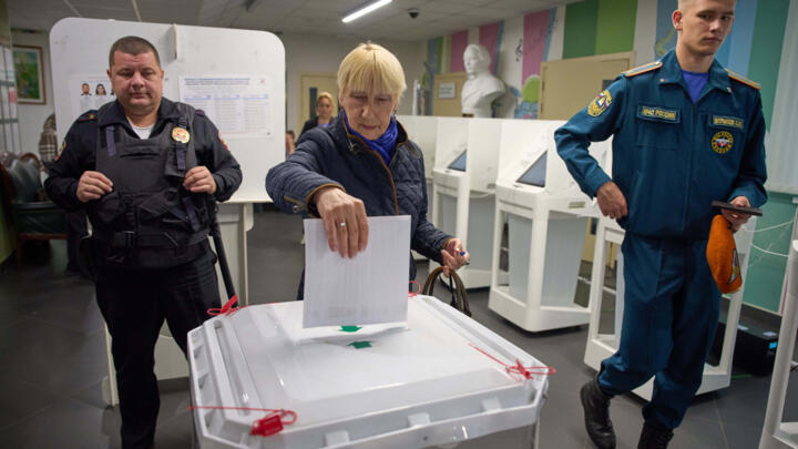 A voter casts a ballot in the parliamentary election in Moscow, Russia, on September 18, 2026