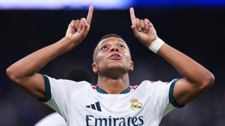 Real Madrid's Kylian Mbappé celebrates scoring his side's 4th goal during the Spanish La Liga soccer match between Real Madrid and Rayo Vallecano in Madrid, Spain, Saturday, September 12, 2026
